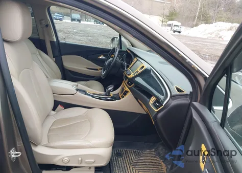 2016 Buick Envision Premium I z USA, uszkodzony, nr VIN LRBFXESX1GD216633